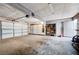 Spacious garage with storage cabinets and ample room for vehicles at 565 Greenbriar Townhouse Way, Las Vegas, NV 89121