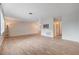 Open-concept living room featuring modern flooring and ample natural light, ready for decor at 565 Greenbriar Townhouse Way, Las Vegas, NV 89121