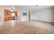 Expansive living room flowing into the kitchen, perfect for modern living and entertaining at 565 Greenbriar Townhouse Way, Las Vegas, NV 89121