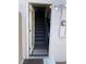 Stairs leading to the lower level of the home at 565 Greenbriar Townhouse Way, Las Vegas, NV 89121