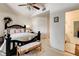 Vaulted ceiling bedroom features en suite bath, ceiling fan and a bench seat at 5908 Marbrisas Ln, Las Vegas, NV 89130
