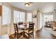 Cozy dining area featuring a round table and bright natural light at 5908 Marbrisas Ln, Las Vegas, NV 89130