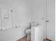 Modern bathroom featuring a toilet, and a towel rack at 6138 Crystal Flower Way, North Las Vegas, NV 89031