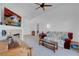 Bright living room with fireplace, vaulted ceiling, and neutral carpet at 6138 Crystal Flower Way, North Las Vegas, NV 89031