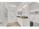 Bright bathroom offers double sinks, modern fixtures, and a glass shower at 66 Chelsea Manor Ct, Las Vegas, NV 89110