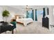 Bright bedroom features neutral colors, ample natural light, and a cozy feel at 66 Chelsea Manor Ct, Las Vegas, NV 89110