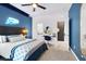 Inviting bedroom features a custom headboard, and modern aesthetic at 66 Chelsea Manor Ct, Las Vegas, NV 89110