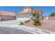 Charming home featuring a three-car garage and well-maintained landscaping at 690 Great Dane Ct, Henderson, NV 89052