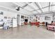 Spacious three-car garage equipped with a pool table and ample room for activities at 690 Great Dane Ct, Henderson, NV 89052
