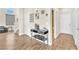 Stylish entryway with modern console table, adjacent doors and hardwood floors at 690 Great Dane Ct, Henderson, NV 89052