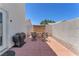 Cozy patio area with decorative fountain and comfortable seating, ideal for relaxing outdoors at 690 Great Dane Ct, Henderson, NV 89052