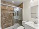 Bathroom featuring a shower with glass doors, a white vanity, and recessed lighting at 727 Heritage Vista Ave, Henderson, NV 89015