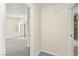 Spacious bedroom featuring plush gray carpeting, sliding closet doors, and lots of natural light at 727 Heritage Vista Ave, Henderson, NV 89015
