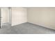 Bright bedroom with plush gray carpeting, base molding, and neutral paint at 727 Heritage Vista Ave, Henderson, NV 89015