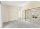 Bedroom with large sliding glass door for natural light and mirrored closet at 727 Heritage Vista Ave, Henderson, NV 89015