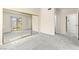 Bedroom with mirrored sliding closet doors and an outdoor view at 727 Heritage Vista Ave, Henderson, NV 89015