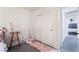 Cozy bedroom featuring whimsical decor, plush carpeting, and closet with sliding doors at 7288 Quarterhorse Ln, Las Vegas, NV 89148