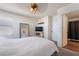 Bright bedroom with large mirror, plush carpet and good natural light at 7288 Quarterhorse Ln, Las Vegas, NV 89148