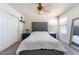 Inviting bedroom features a comfortable bed, neutral colors, and a spacious closet at 7288 Quarterhorse Ln, Las Vegas, NV 89148