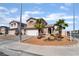 Charming two-story home with a well-manicured front yard and an attached two-car garage at 7288 Quarterhorse Ln, Las Vegas, NV 89148