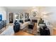 Bright and open living room with a fireplace and balcony at 7648 Rolling View Dr # 201, Las Vegas, NV 89149