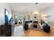 Comfortable living room with ample light, fireplace and access to a balcony at 7648 Rolling View Dr # 201, Las Vegas, NV 89149