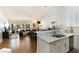An open concept living space with a seamless flow between kitchen, dining, and living areas at 7648 Rolling View Dr # 201, Las Vegas, NV 89149