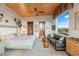 Bright main bedroom featuring wood ceiling, ensuite access and mountain views at 8 Meadowhawk Ln, Las Vegas, NV 89135
