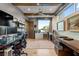 This office space offers custom built-ins, exposed beams and great natural light from the window at 8 Meadowhawk Ln, Las Vegas, NV 89135