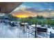 Outdoor space with seating, a bar, and a pool, perfect for entertaining with sunset views at 8 Meadowhawk Ln, Las Vegas, NV 89135