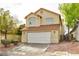 Well-kept two-story home boasts beautiful landscaping, mature trees, and an attached two-car garage for convenience at 8113 Bay Springs Dr, Las Vegas, NV 89128