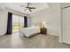 Relaxing bedroom featuring natural light, ceiling fan, and view at 8255 Las Vegas Blvd # 1821, Las Vegas, NV 89123