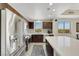 Modern kitchen boasts stainless appliances, sleek countertops and amazing views through large windows at 8255 Las Vegas Blvd # 1821, Las Vegas, NV 89123