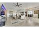 Spacious living area with modern furnishings and an open layout to the kitchen and dining area at 8255 Las Vegas Blvd # 1821, Las Vegas, NV 89123