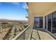 Balcony showcasing city views with desert landscaping, mountains, and sliding glass doors at 8255 Las Vegas Blvd # 1821, Las Vegas, NV 89123