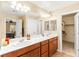 Modern bathroom with separate shower, double vanity, and neutral colors at 8316 Mokena Ave, Las Vegas, NV 89178