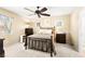 Bedroom featuring a ceiling fan, neutral colors and natural lighting at 8316 Mokena Ave, Las Vegas, NV 89178