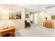 Neutral bonus room with carpeted floors and modern chair at 8316 Mokena Ave, Las Vegas, NV 89178