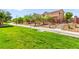 Scenic view of a community trail with lush greenery and a convenient walking path at 8316 Mokena Ave, Las Vegas, NV 89178
