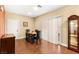 Cozy dining area with a wooden table set and stylish display cabinet at 8316 Mokena Ave, Las Vegas, NV 89178