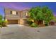Charming two-story home features a well-manicured lawn and a spacious driveway leading to a two-car garage at 8316 Mokena Ave, Las Vegas, NV 89178