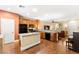 Stylish kitchen with granite countertops, stainless steel appliances, and dark wood cabinetry at 8316 Mokena Ave, Las Vegas, NV 89178