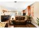 Cozy living room next to the kitchen with natural light, comfortable seating, and decorative touches at 8316 Mokena Ave, Las Vegas, NV 89178