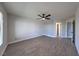 Large bedroom with wood-look flooring and ceiling fan at 842 Envoy Cir, Henderson, NV 89002