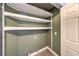 Laundry room with shelves, laminate flooring, and washer/dryer hookups at 842 Envoy Cir, Henderson, NV 89002