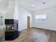 Bright living room with wood floors and a modern fireplace at 8981 Rivers Edge Dr, Las Vegas, NV 89117