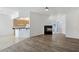 Open-concept living room featuring tile flooring and a fireplace at 8981 Rivers Edge Dr, Las Vegas, NV 89117