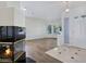 Spacious living room featuring a fireplace and entry way at 8981 Rivers Edge Dr, Las Vegas, NV 89117