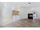 Open-concept living room featuring tile flooring and a fireplace at 8981 Rivers Edge Dr, Las Vegas, NV 89117