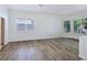 Spacious living room featuring wood flooring and natural light at 8981 Rivers Edge Dr, Las Vegas, NV 89117